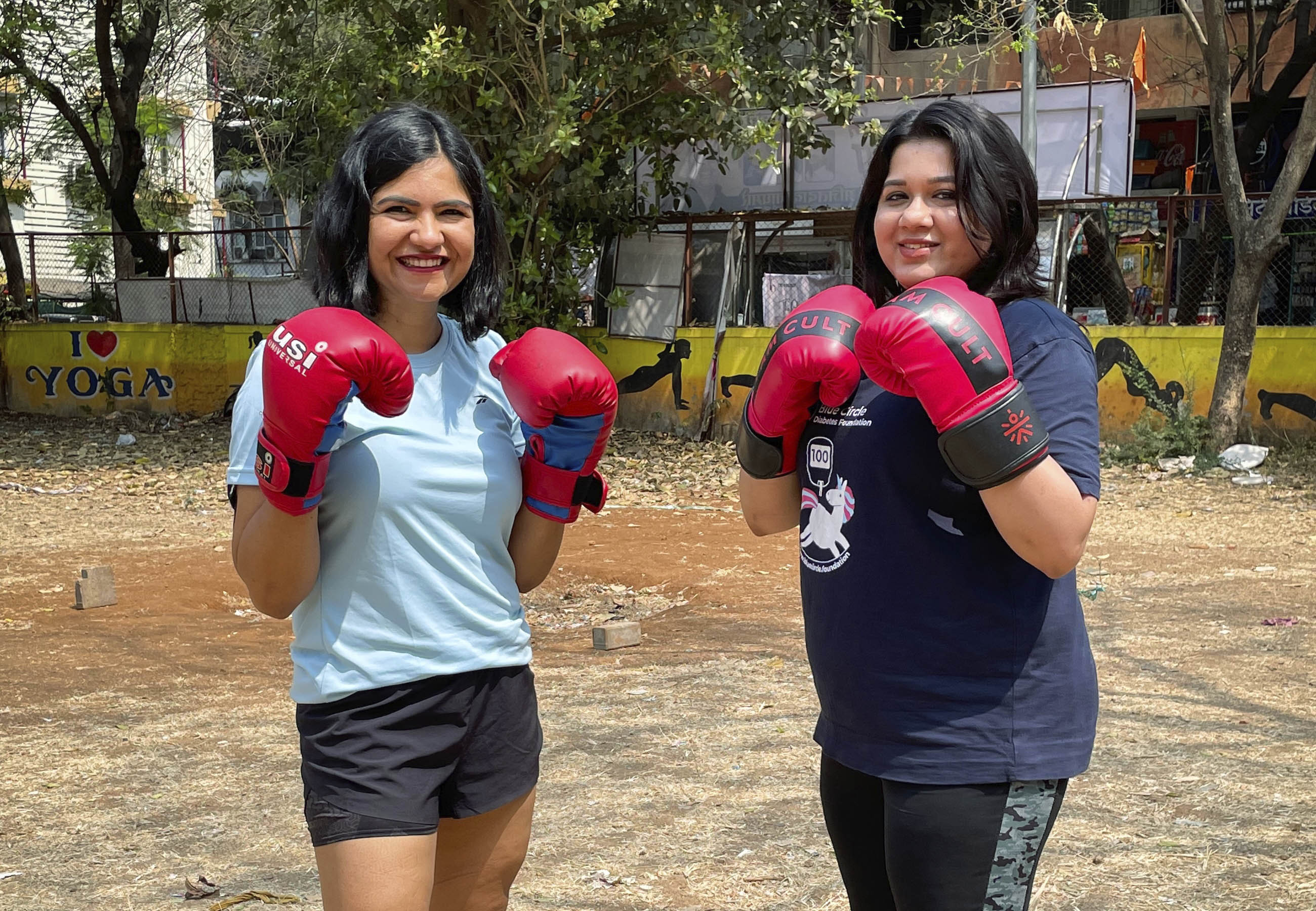 Woman in india with boxing gloves NCD advocates