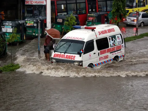 Ambulance stuck in flooded street in Bangladesh 