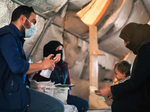 Syrian refugee receives medical assistance in field hospital 