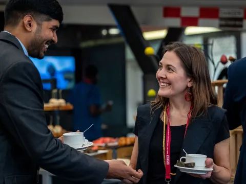 women chatting a NCD alliance Forum in Kigali