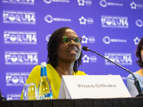 kenyan woman speaking into microphone at press conference