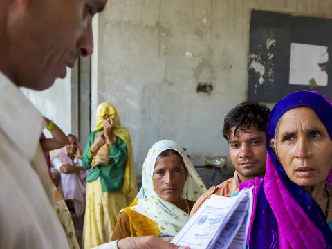 Indian senior patient queuing to have a free medical consultation in Agra, India 2010