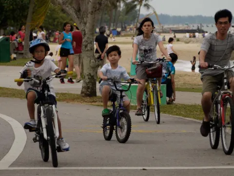 A Singaporean family enjoys a day out at the East Coast Park