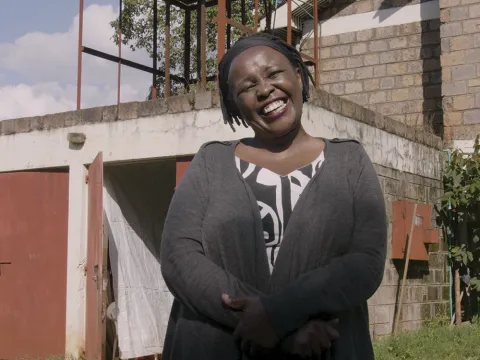 smiling african woman and mental health activist
