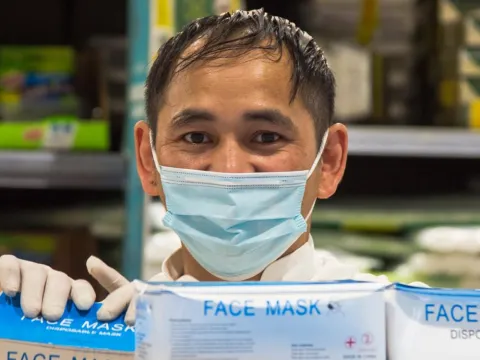 Man in pharmacy with face masks