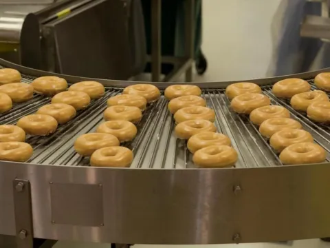 Image of production line with doughuts