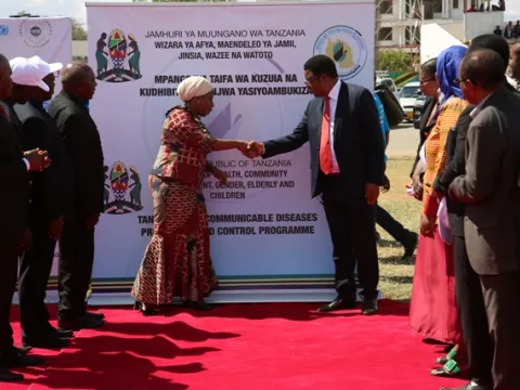 Tanzania Prime Minister Kassim Majaliwa congratulating the Minister of Health, Hon Ummy Mwalimu