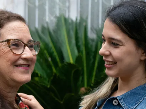 A women who receives cancer care treatment in Paraguay with her daughter