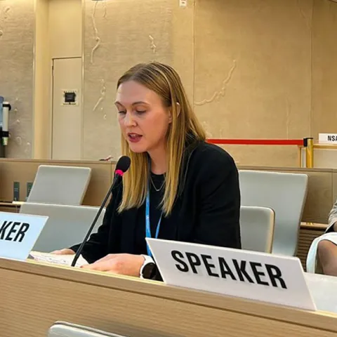 Speaker at the World Health Organization in Geneva reading text