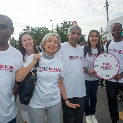 NCD advocates at Walk the Talk in Geneva smiling for Time to Lead campaign