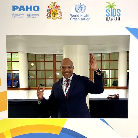 Caribbean man with thumbs up at NCD event