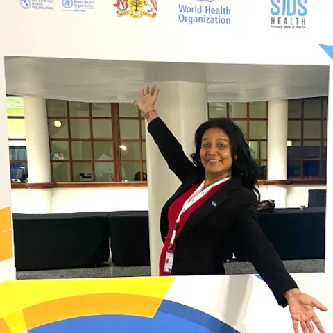 advocate with hands out stretched at NCD advocacy event in Barbados